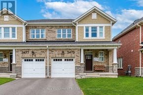 Oakville (Go Glenorchy) townhouse for rent - A two-story house with the numbers 3477 and 3475 on the front.