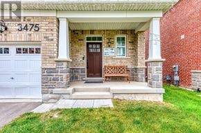 Oakville (Go Glenorchy) townhouse for rent - A house with the number 3475 on the front wall.