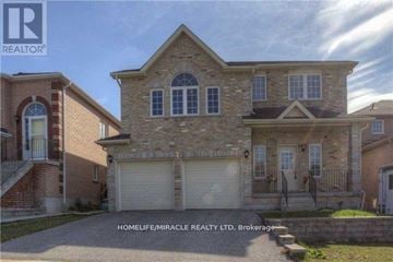 Barrie (Ardagh) apartment for rent - A large brick house with a garage is for sale.