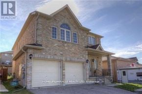 Barrie (Ardagh) apartment for rent - A two-story house with a garage is for sale.