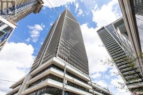 Toronto (Niagara) condo for rent - A tall building with the words "Hazleton Road" on it.