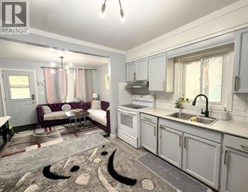Windsor apartment for rent - A kitchen and living room are shown in a real estate listing.