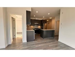 Langley apartment for rent - A modern kitchen with a large island in the middle.
