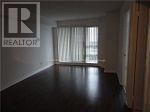 Toronto (Henry Farm) condo for rent - A room with a window and a curtain with a sign that says REALTOR.
