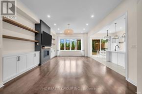 Aurora (Aurora Estates) apartment for rent - A spacious living room with wood flooring and a large window.