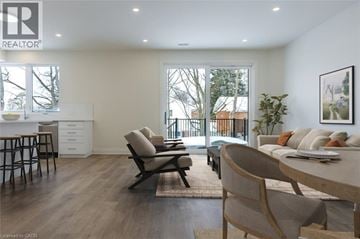 Rockwood apartment for rent - A modern living room with a dining table and chairs.
