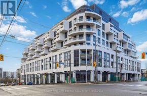 Toronto (Englemount-Lawrence) condo for rent - A large white building with balconies is under construction.