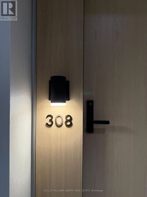 Toronto (Englemount-Lawrence) condo for rent - A door with the number 308 on it.