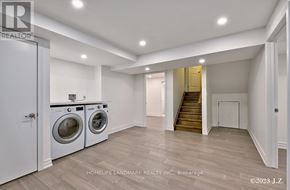 Vaughan (Kleinburg) apartment for rent - A laundry room with a washer and dryer in it.