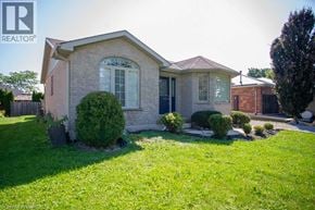 Port Dover apartment for rent - A house with a lawn in front of it.