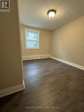 Mississauga (Cooksville) condo for rent - A room with a window and wooden flooring.