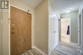 Toronto (Don Valley Village) condo for rent - A wood door with a white door on the other side.