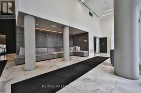 Vaughan (Concord) condo for rent - A modern living room with a black and white color scheme.