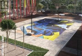 Markham (Unionville) condo for rent - A basketball court with a blue and yellow design on it.