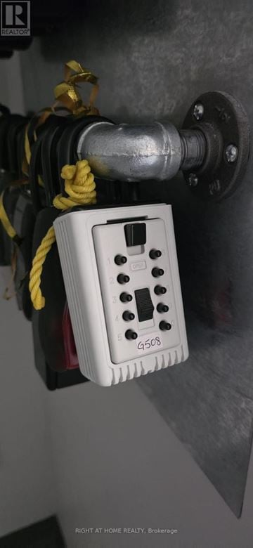 Waterloo condo for rent - A white electrical outlet box with the label G503 is attached to a wall.