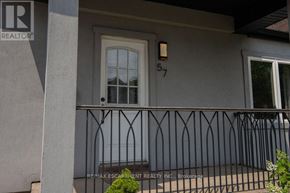 Hamilton (Homeside) apartment for rent - A house numbered 57 with a balcony and a window.