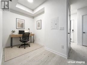 Oakville (Ga Glen Abbey) condo for rent - A white room with a desk and a chair.