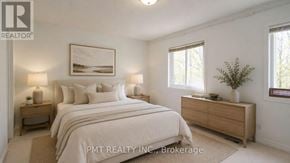 Toronto (West Hill) townhouse for rent - A well-lit bedroom with a large bed, nightstands, and a framed picture on the wall.