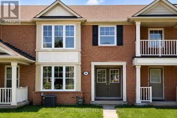 Markham (Cornell) apartment for rent - A red brick house with a white door and windows.