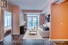 Toronto (Henry Farm) condo for rent - A living room with a couch, coffee table, and pictures on the wall.