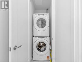 Vaughan (Vellore Village) condo for rent - A white washing machine and dryer in a small laundry room.