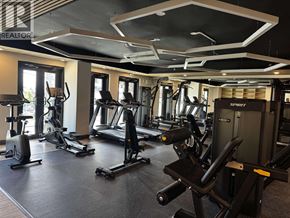 New Westminster apartment for rent - A gym with a variety of exercise equipment including treadmills, stationary bikes, and weight machines.