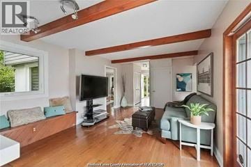 Windsor apartment for rent - A living room with a television and a couch.