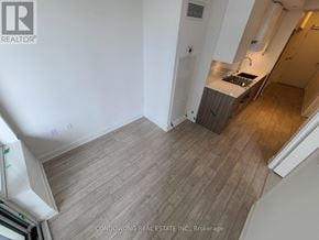 Toronto (Mount Pleasant West) condo for rent - A kitchen area with a sink and a countertop.