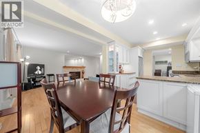 North Vancouver apartment for rent - A dining room with a wooden table and chairs.