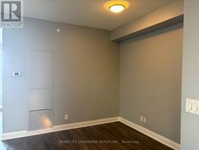 Markham (Unionville) condo for rent - A room with a grey wall and a white door.