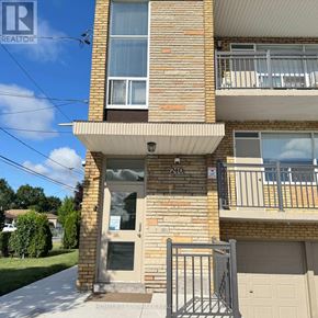 Toronto (Bathurst Manor) triplex for rent - A building with the number 240 on it.