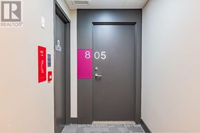 Toronto (Mount Pleasant West) condo for rent - A black door with a pink sign that says 805.