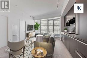 Toronto (Bayview Village) condo for rent - A modern living room with a dining area and kitchen in the background.