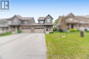 Grey Highlands townhouse for rent - A real estate company is showcasing a residential area with houses and a driveway.