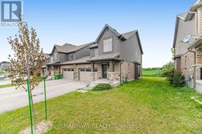 Grey Highlands townhouse for rent - A large house with a garage is for sale.