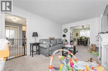 Cambridge apartment for rent - A living room with a grey couch and a television.