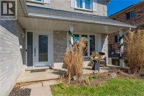 Cambridge apartment for rent - A house with a realtor sign on the side.