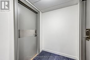 Toronto (Bayview Village) condo for rent - A room with a door and a wall with a number 822 on it.
