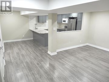Clarington (Courtice) apartment for rent - A kitchen area with a counter and cabinets.