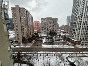 Mississauga (City Centre) condo for rent - A view of a snowy cityscape from a high vantage point.