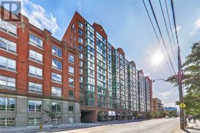 Toronto (Niagara) condo for rent - A street view of a building with the sun shining through the windows.