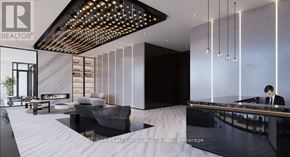 Toronto (Dovercourt-Wallace Emerson-Junction) condo for rent - A modern office lobby with a reception desk and a person working behind it.