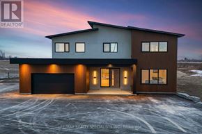Amaranth apartment for rent - A modern house with a garage is shown in the image.