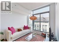 Toronto (Church-Yonge Corridor) condo for rent - A living room with a white couch and a checkered floor.