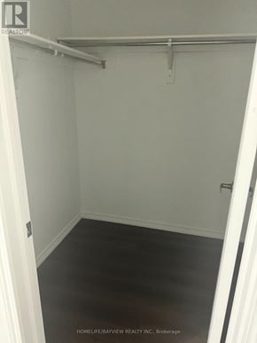 Brampton (Northwest Brampton) apartment for rent - A white closet with a black floor and a white door.