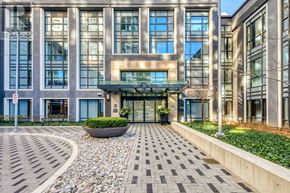 Toronto (Islington-City Centre West) condo for rent - A building with a stone pathway leading to the entrance.