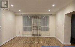 Richmond Hill (Mill Pond) apartment for rent - A room with a window covered by curtains and wooden flooring.