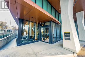Toronto (Islington-City Centre West) condo for rent - The image shows the entrance to a building with a glass door and a sign that reads "Hester 2".