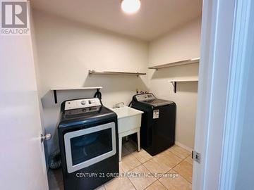 Ajax (Central) apartment for rent - A small kitchen with a microwave and a toaster oven.