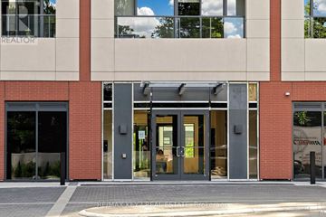 Toronto (Humber Heights) condo for rent - A modern kitchen with a sink and a view of the street outside.
